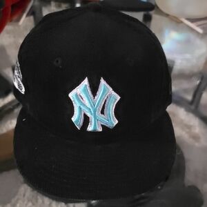 Black Courderoy Yankess Cap with Tiffany Blue NY Logo 7 1/8. (721)